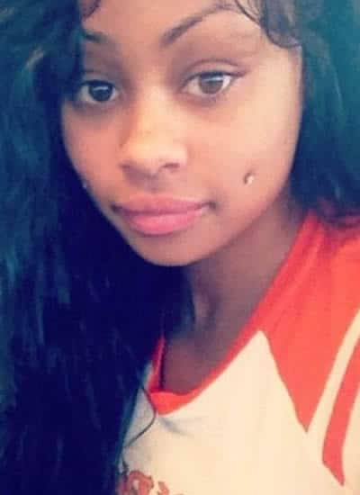 Blac Chyna in her teens with dimple piercing.