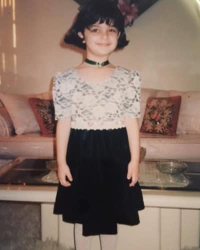 Bebe Rexha as a child